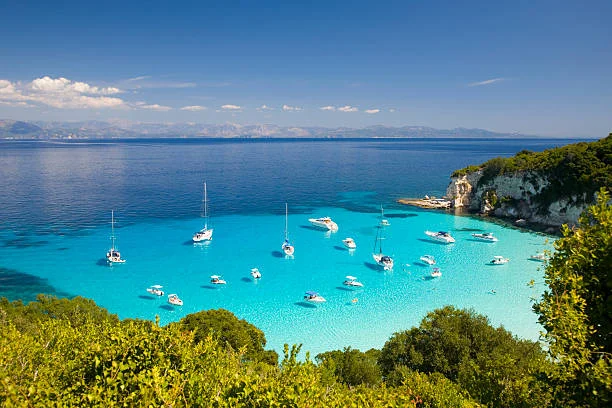 Paxos and Antipaxos: Escape the crowds on these hidden gems. Explore Paxos' olive groves and vineyards, visit Antipaxos for incredible snorkeling, and relax on pristine beaches like Voutoumi and Monodendri.