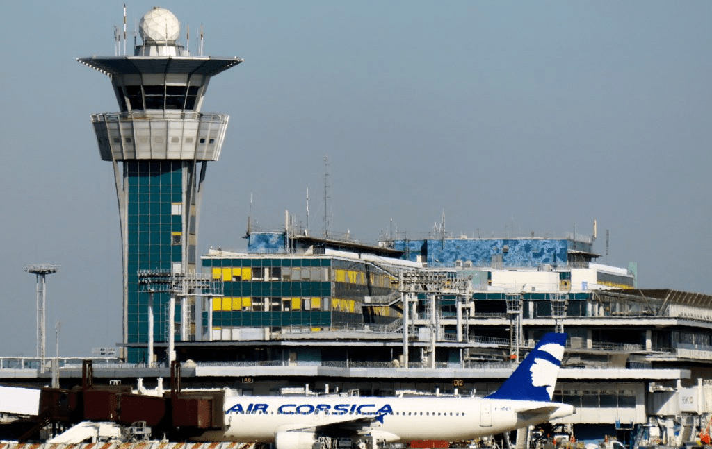 Passenger terminal at Paris Orly Airport with elegant French interior design and high passenger traffic