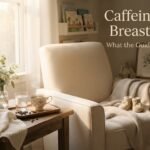 Cup of coffee beside nursing pillow illustrating how much caffeine is safe while breastfeeding